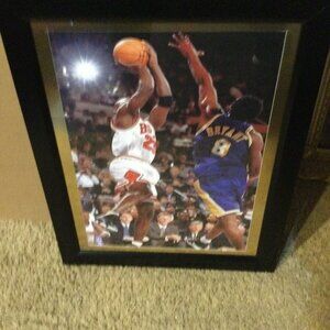 Mike and Kolby 2 champions square off in a black frame.